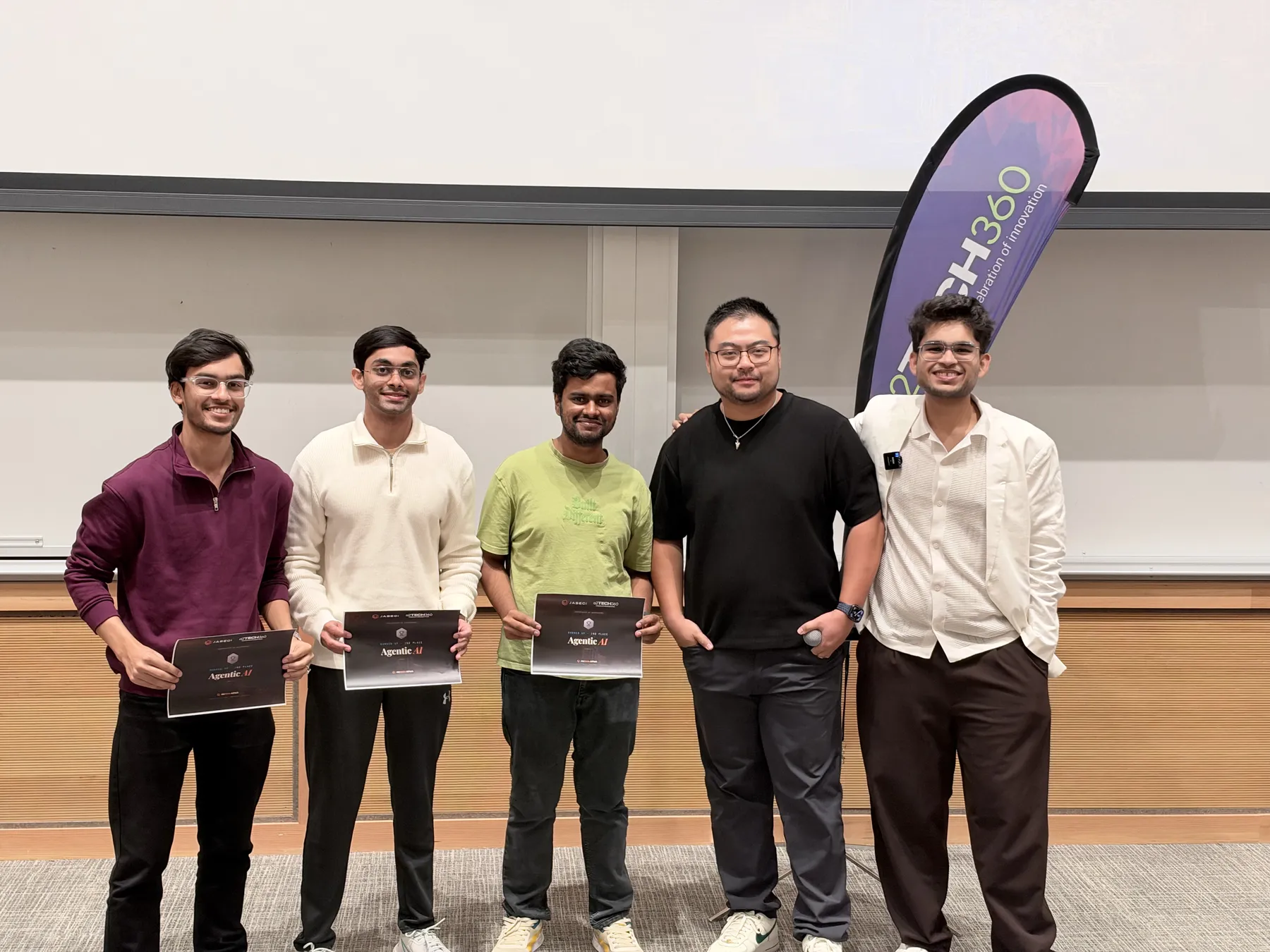 Winners holding their certificates at JacHacks A2Tech