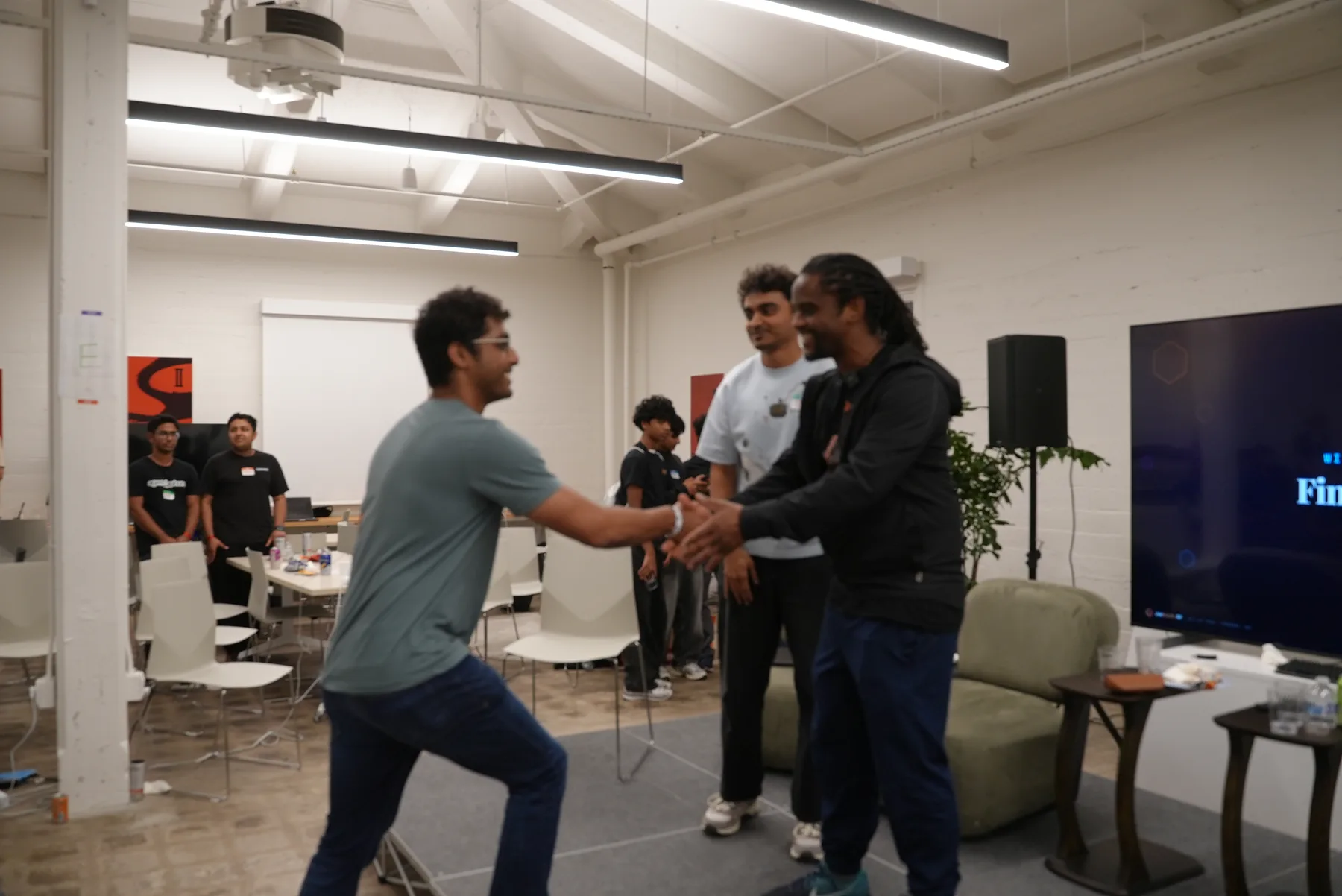 Handshake at the JacHacks SF closing ceremony