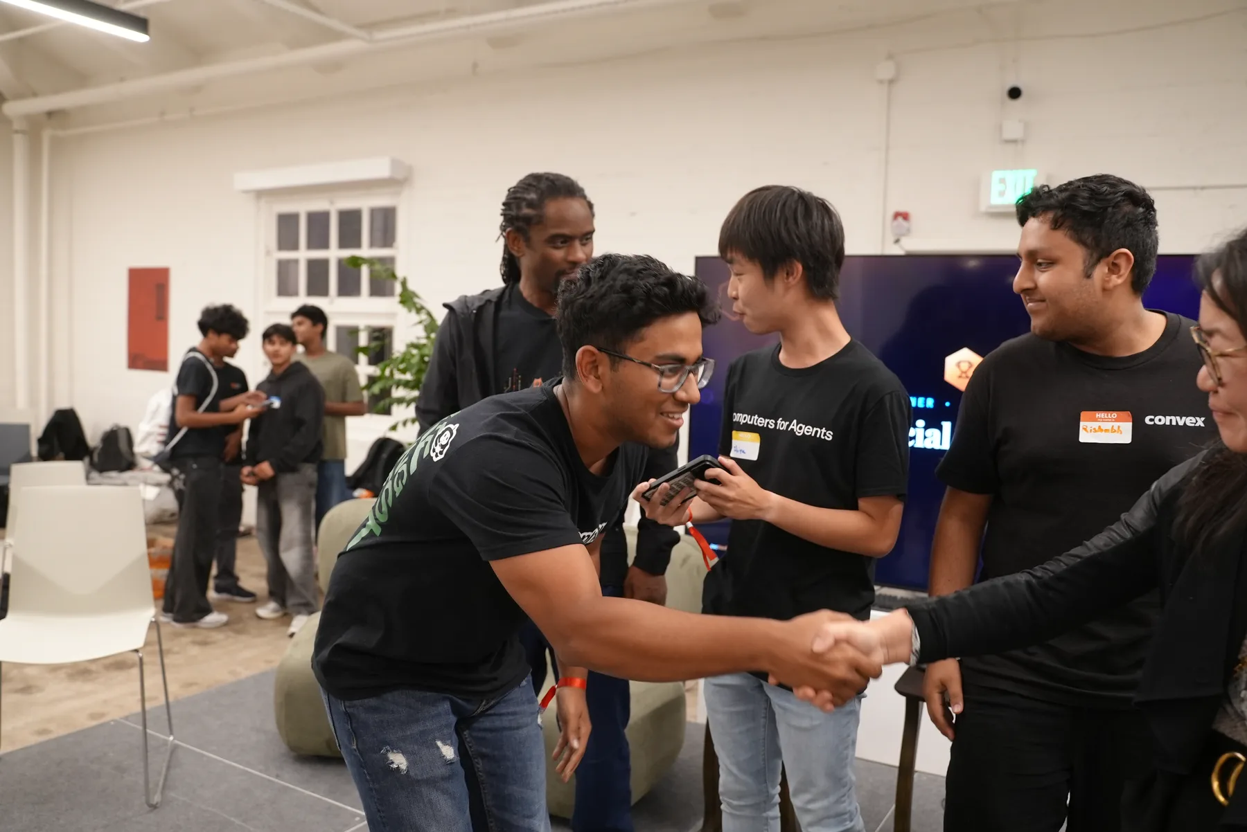 Builders exchanging contacts