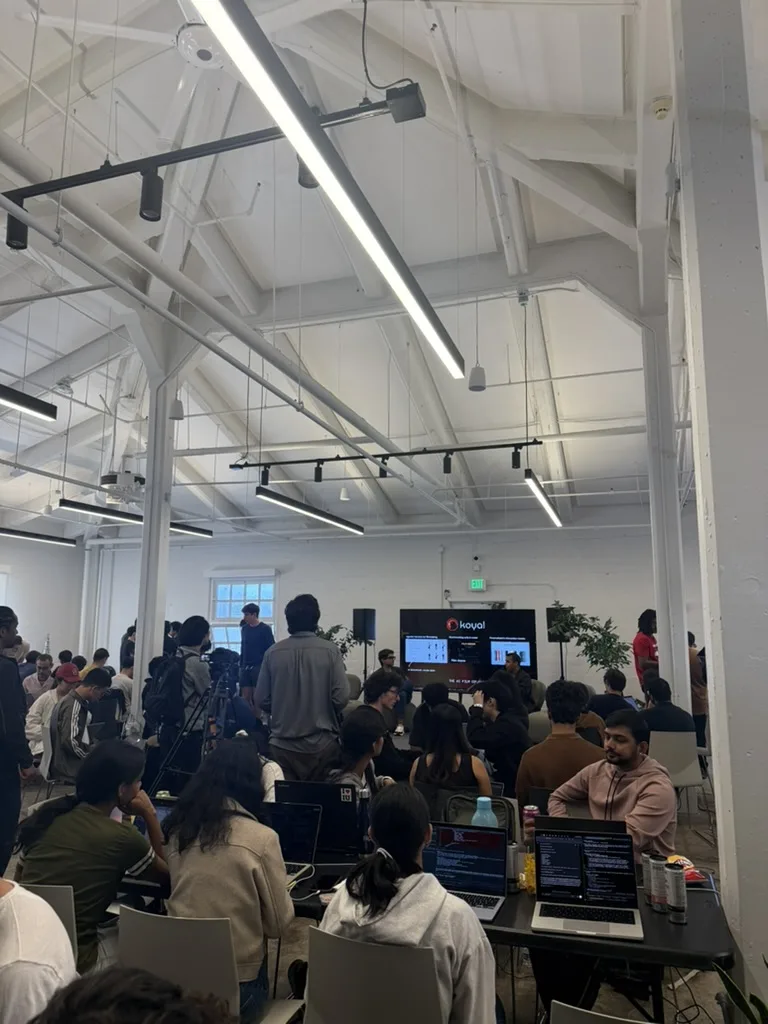 Builders at their tables at JacHacks SF