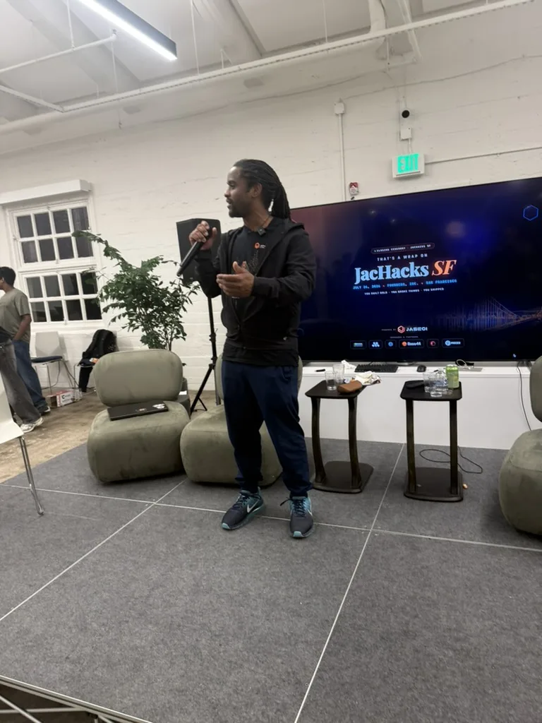 Organizer presenting the JacHacks SF tracks