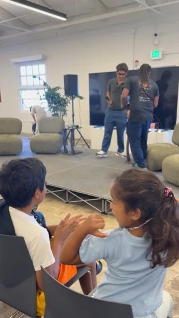 Audience applauding at JacHacks SF