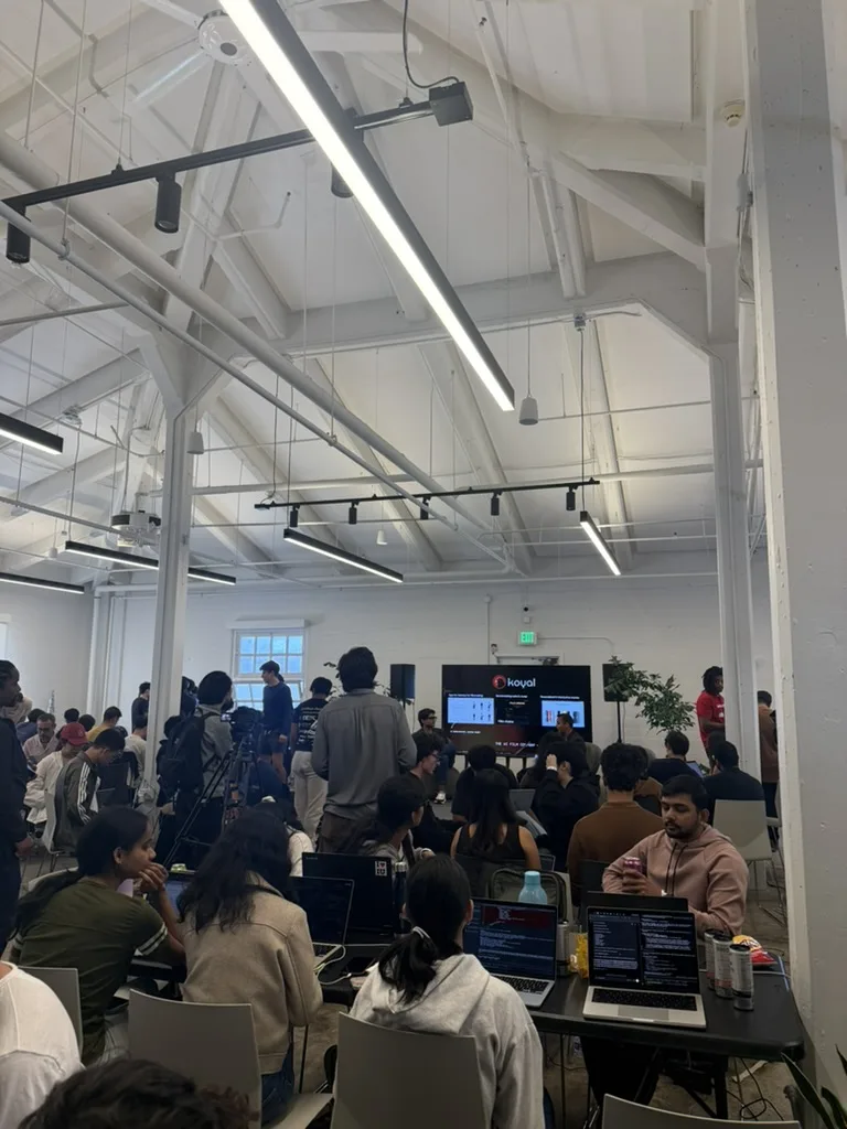 Hackers working during a talk at JacHacks SF