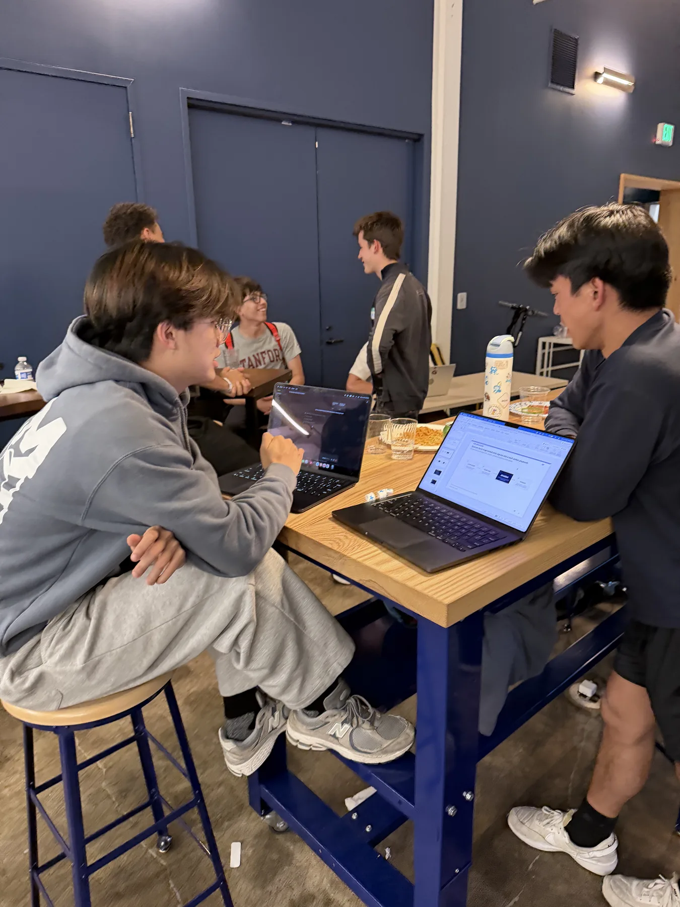 Mentor helping a team at JacHacks SF